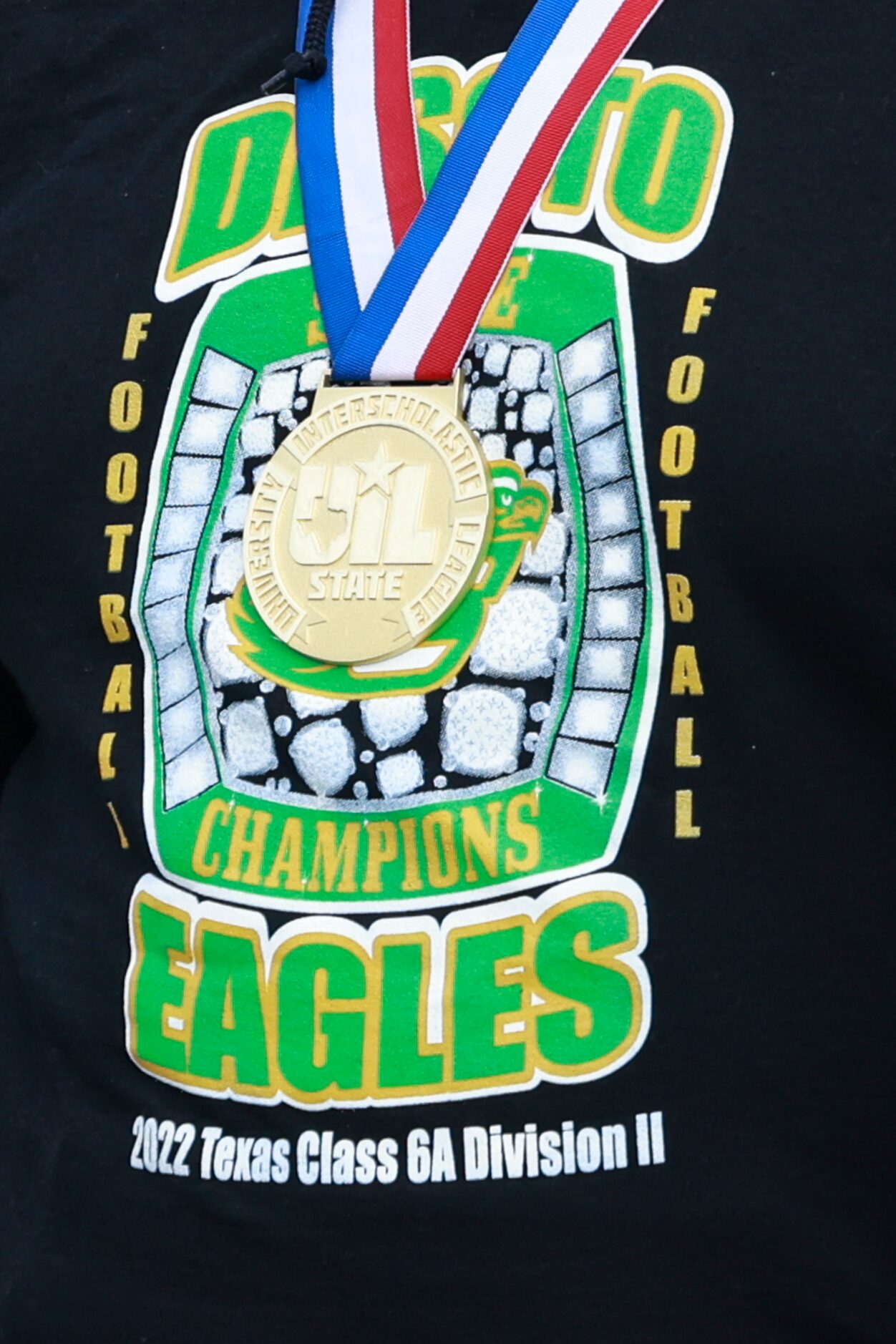 A DeSoto High School football player wears his State Championship medal, Saturday, Jan. 21,...