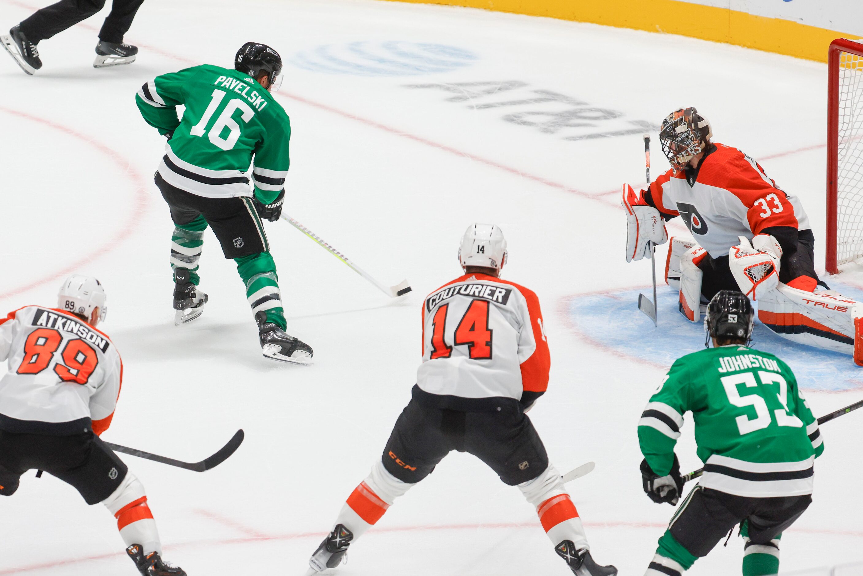 Dallas Stars center Joe Pavelski (16) shoots as he scores during overtime of an NHL hockey...