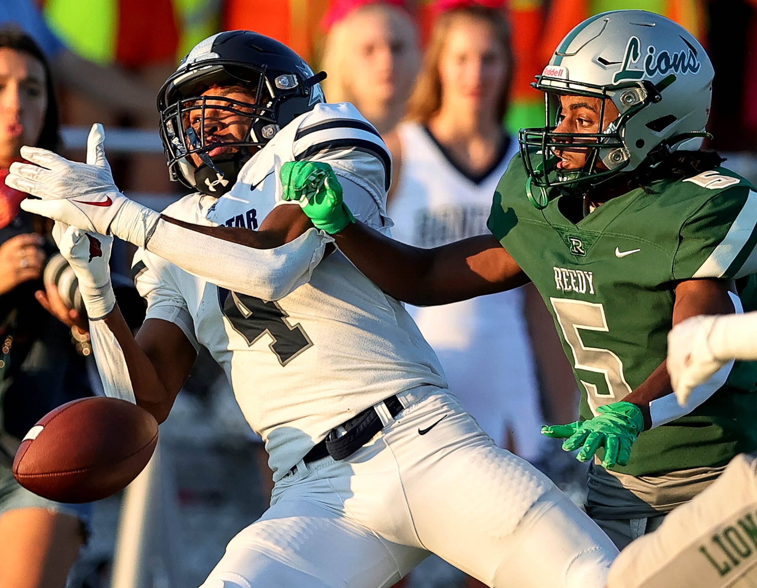 Frisco Lone Star wide receiver Jaylon Braxton (4) tries to come up with a reception against...