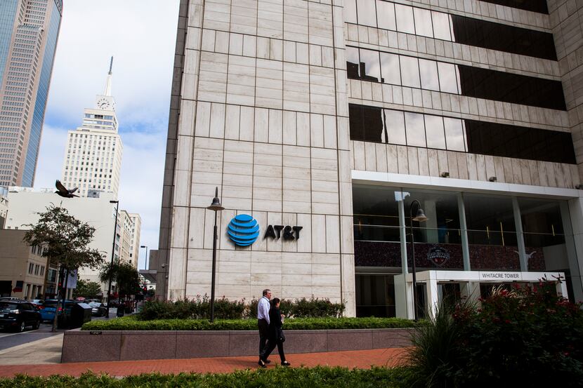 The corporate headquarters of AT&T, including  Whitacre Tower at AT&T Plaza on Friday,...