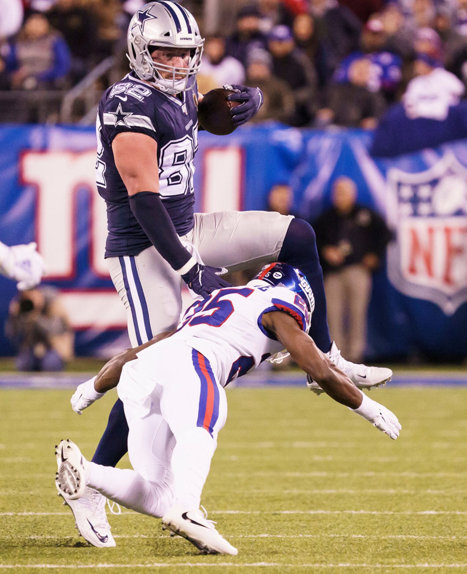Dallas Cowboys tight end Jason Witten (82) tries to hurdle New York Giants defensive back...