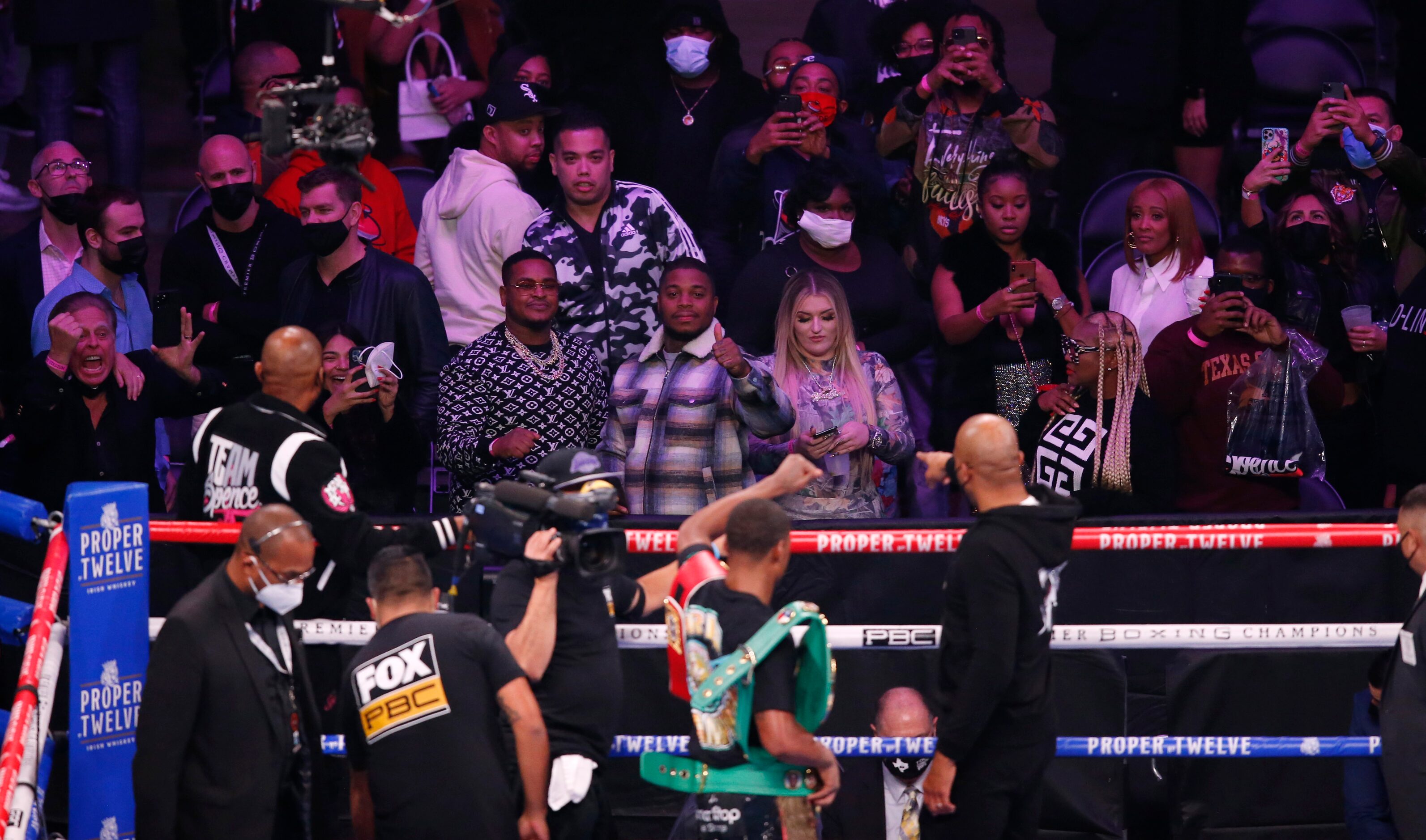 Errol Spence, Jr. acknowledges people in the stands after defeating Danny García in a WBC &...