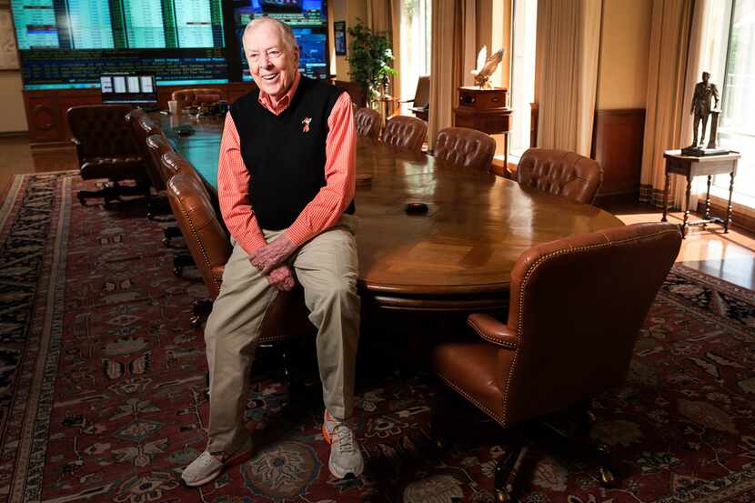 T. Boone Pickens, who's about to turn 91, photographed with his conference room table.