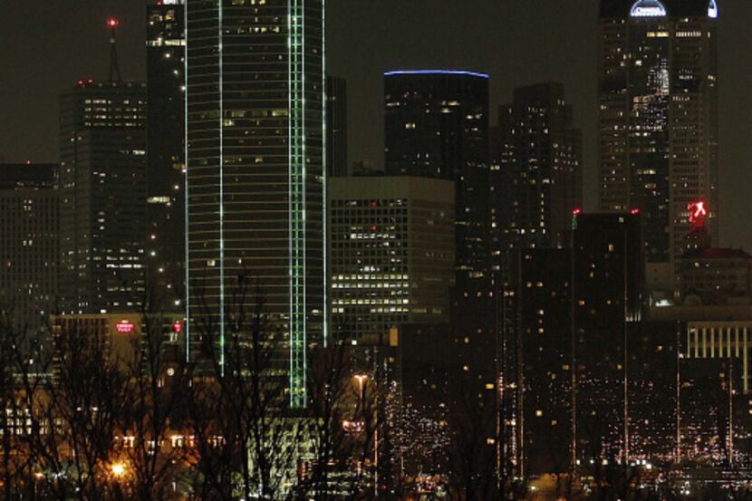 The project will replace the  Bank of America Plaza's signature green argon lighting with a...