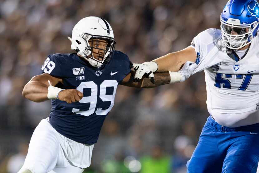 Penn State defensive end Yetur Gross-Matos (99) fights off a block by Buffalo offensive...