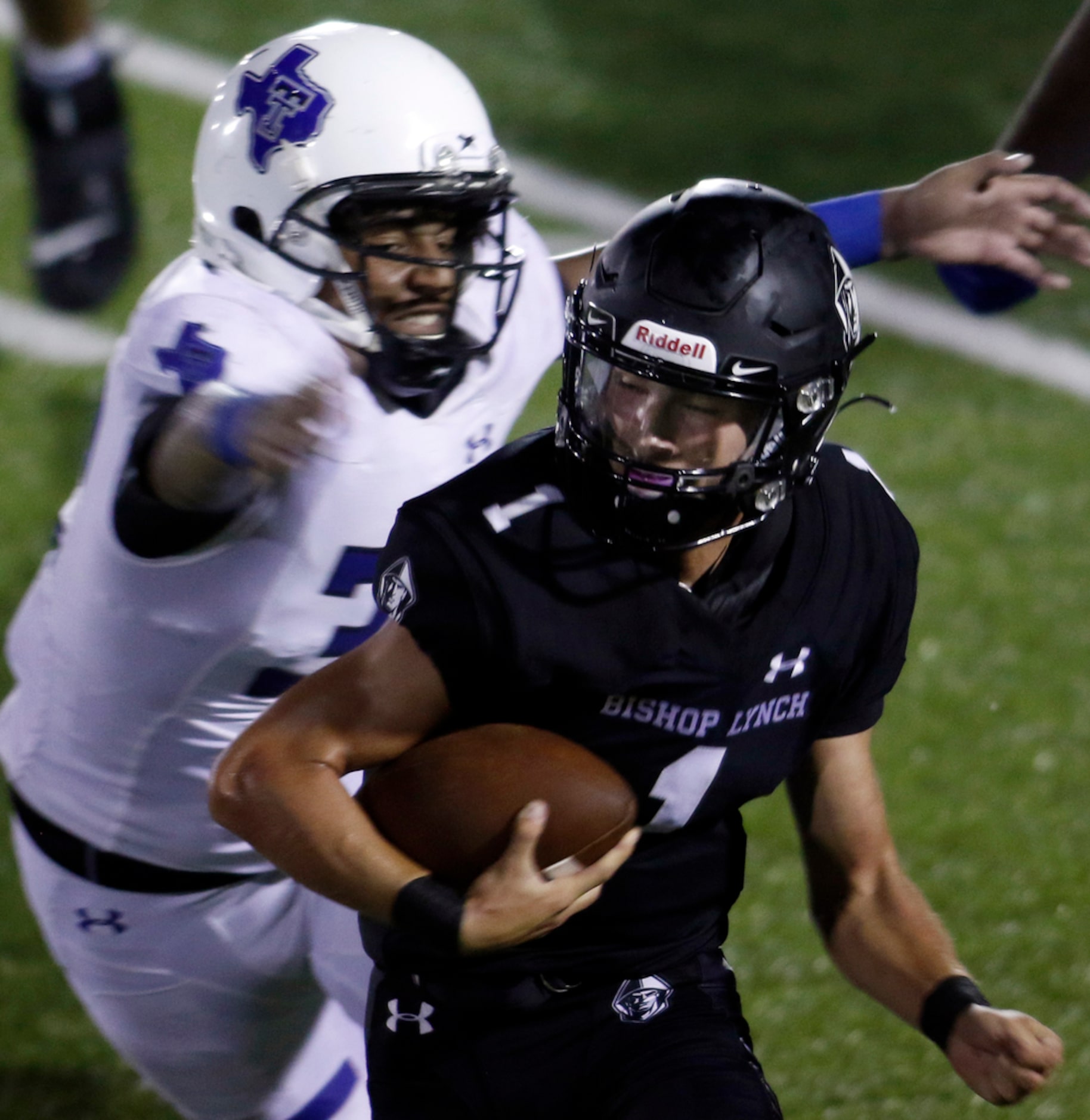 Trinity Christian-Cedar Hill linebacker Jeremiah McNeeley (32) pressures Bishop Lynch...