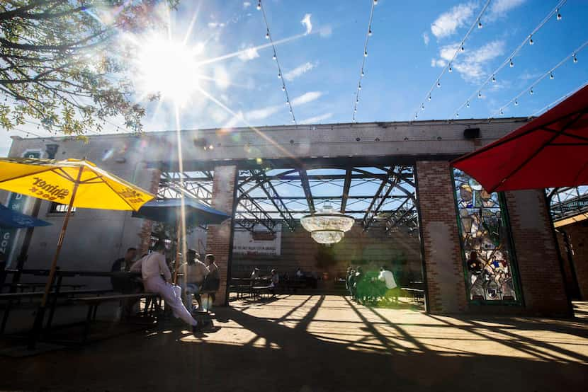 Dot's Hop House & Cocktail Courtyard has a massive patio with an elegant outdoor chandelier....