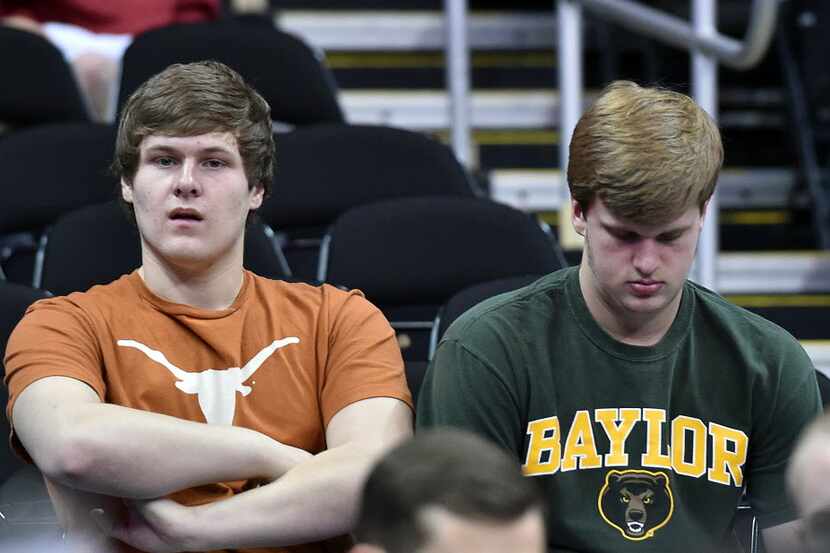 Mar 10, 2016; Kansas City, MO, USA; Two fans show their support for both the Baylor Bears...