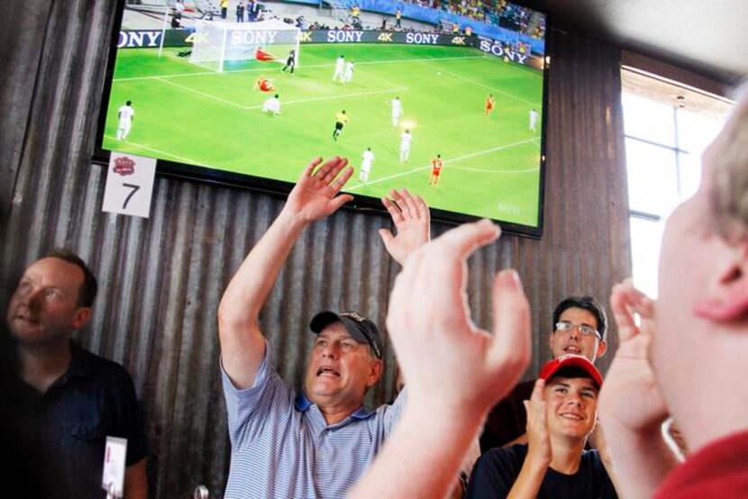 
Mayor Mike Rawlings was among fans getting caught up in the moment while watching the...