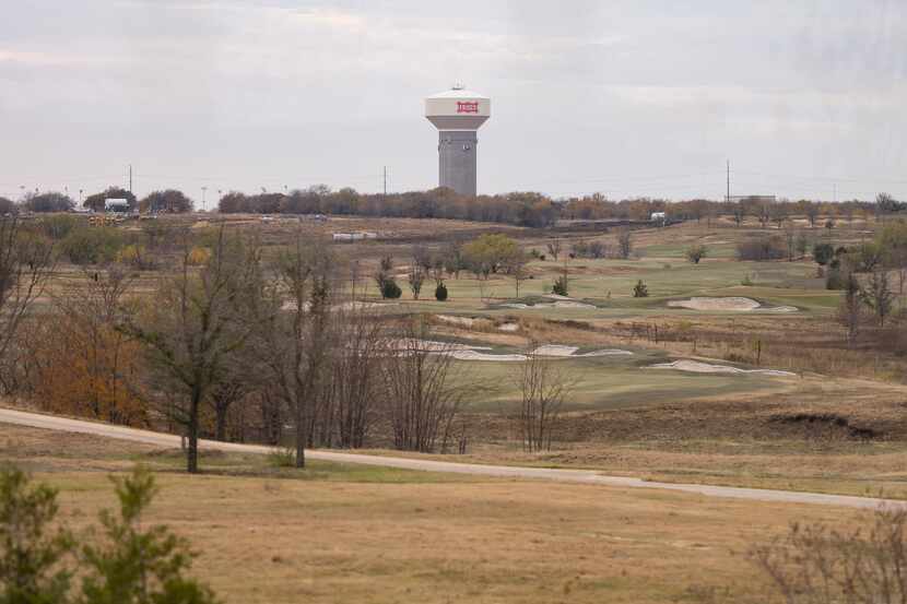 The Frisco water tower and golf course seen from the Omni PGA Frisco resort on Tuesday, Dec....