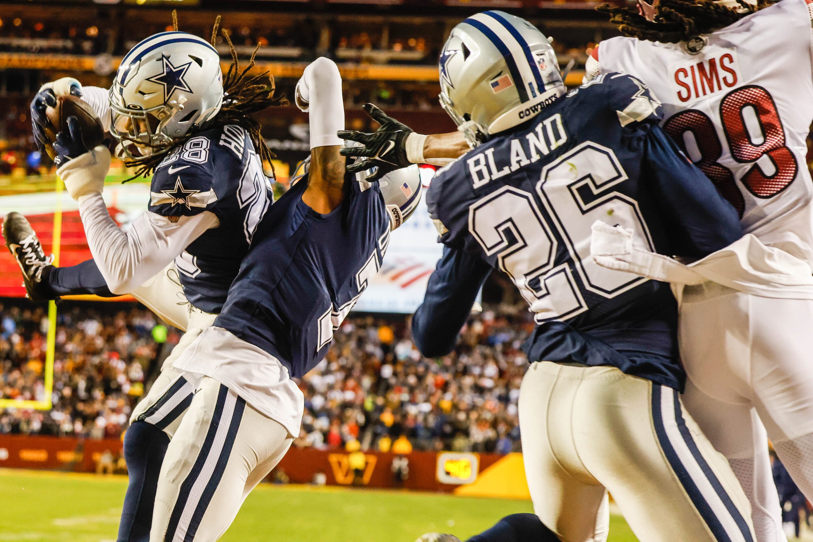 Dallas Cowboys wide receiver CeeDee Lamb (88) intercepts a pass for the Washington...