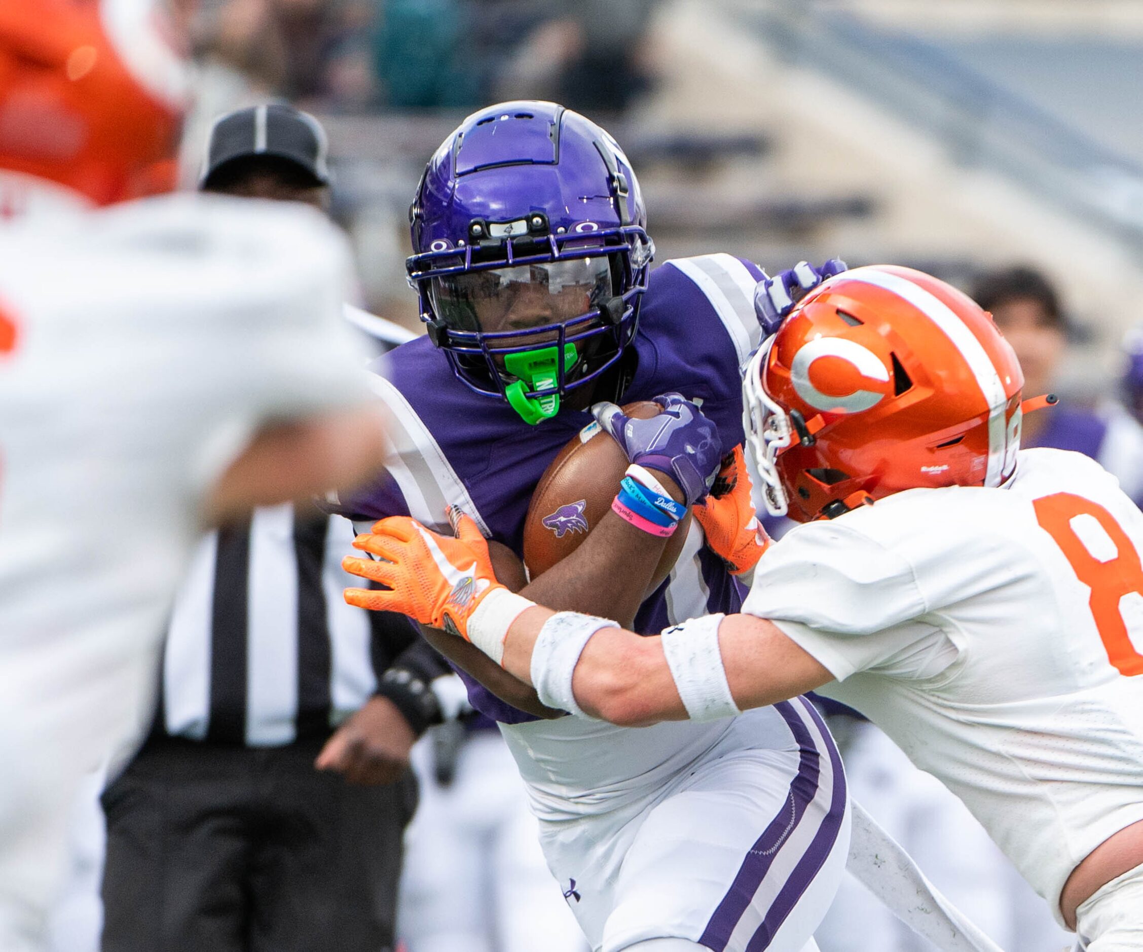 Anna’s Jacob Emmers (11) is pushed out of bounds by Celina's Collin McKiddy (8) in the first...