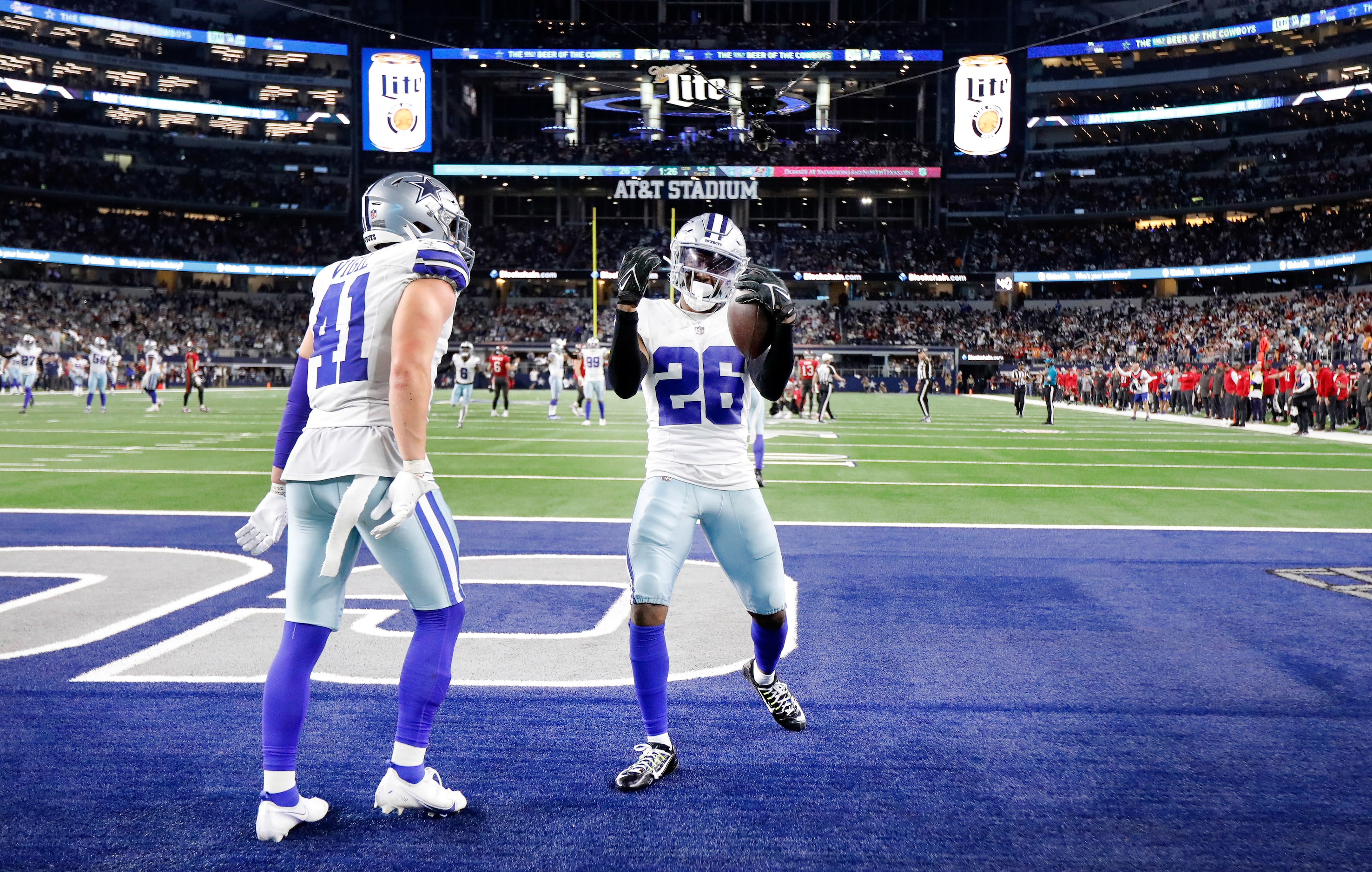 Dallas Cowboys cornerback DaRon Bland (26) celebrates after ripping the ball from Tampa Bay...