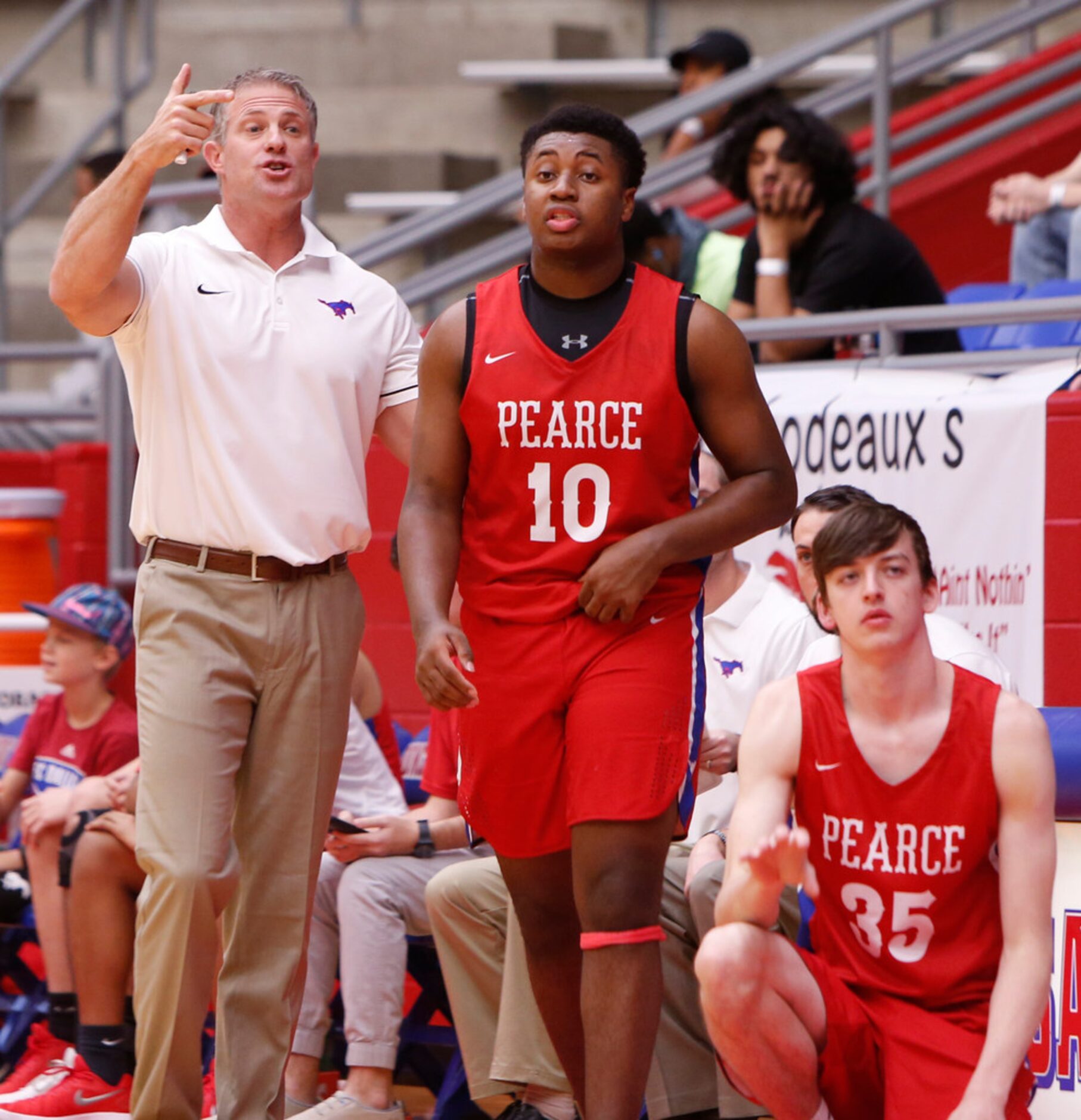 Richardson JJ Pearce head coach Marc Johnson makes a point from the team sideline during...