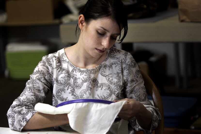 Megan Paur works on a satin stitch during a hand embroidery class in 2008. Arts and crafts...