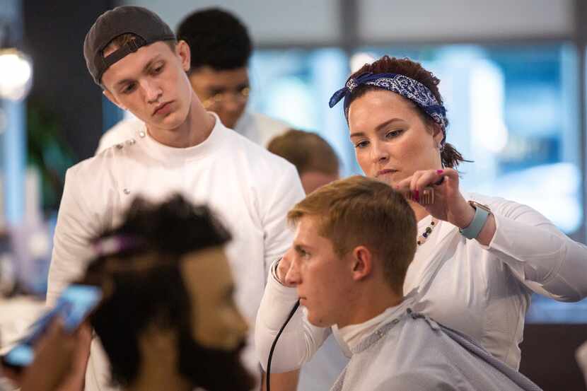 Lead educator Nicole McCarter (right) instructs student James Huffman (left) at the Blade...