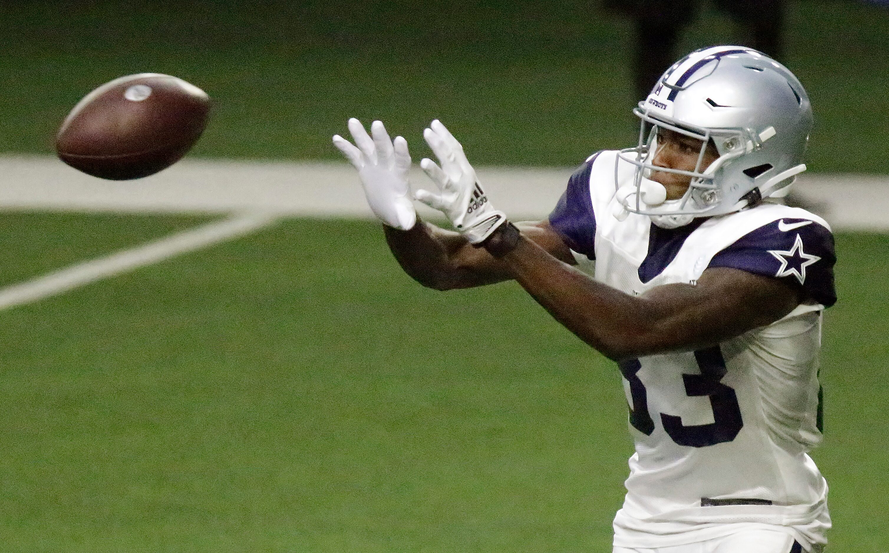 Dallas Cowboys wide receiver Jalen Brooks (83) catches a pass as the Dallas Cowboys held...