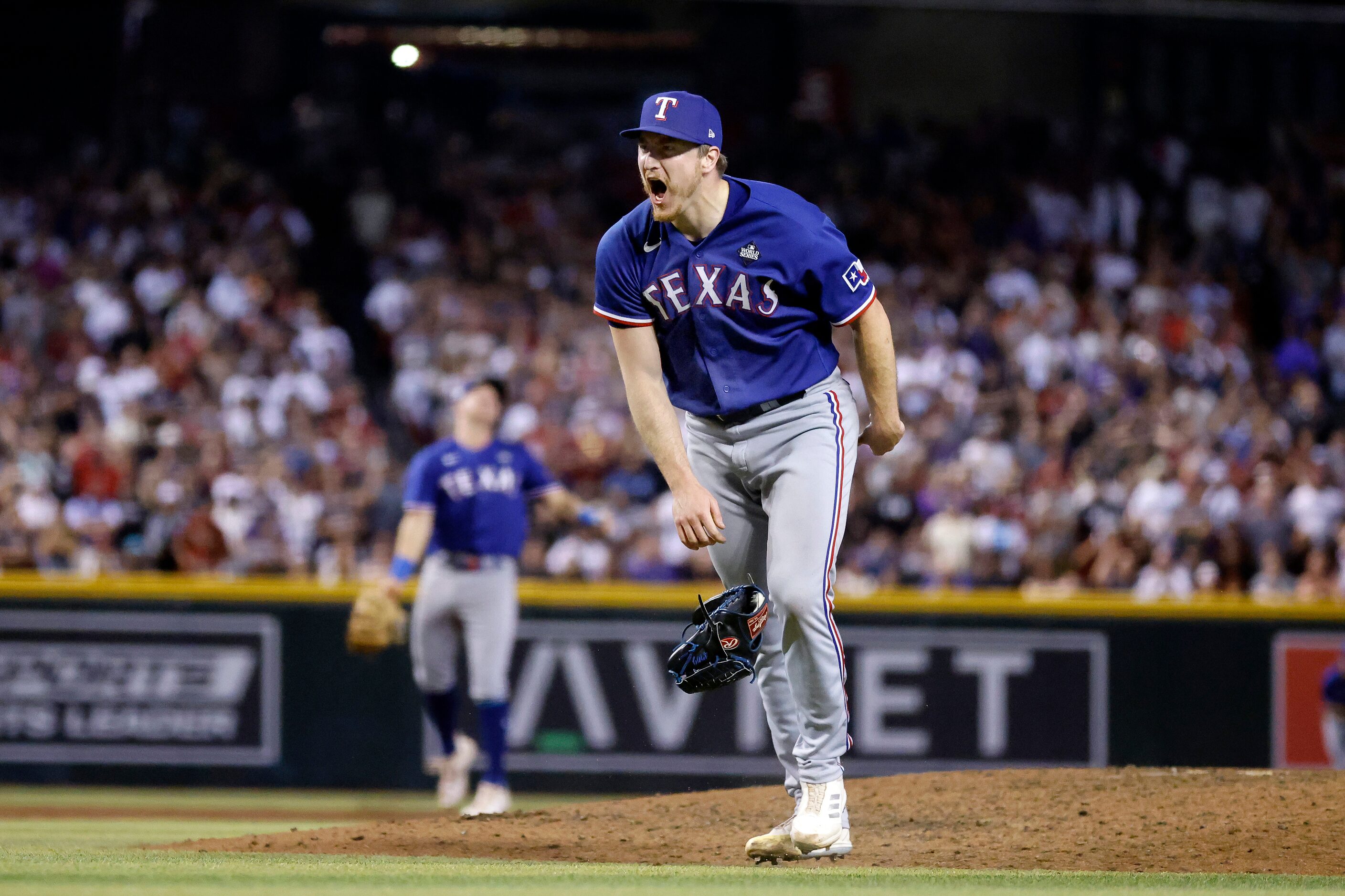 Texas Rangers relief pitcher Josh Sborz (66) throws down his glove after making the final...