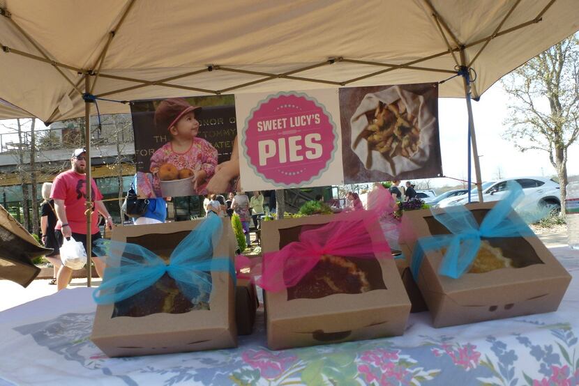 Sweet Lucy's Pies is another tent at Clearfork Farmers Market in Fort Worth. The little girl...