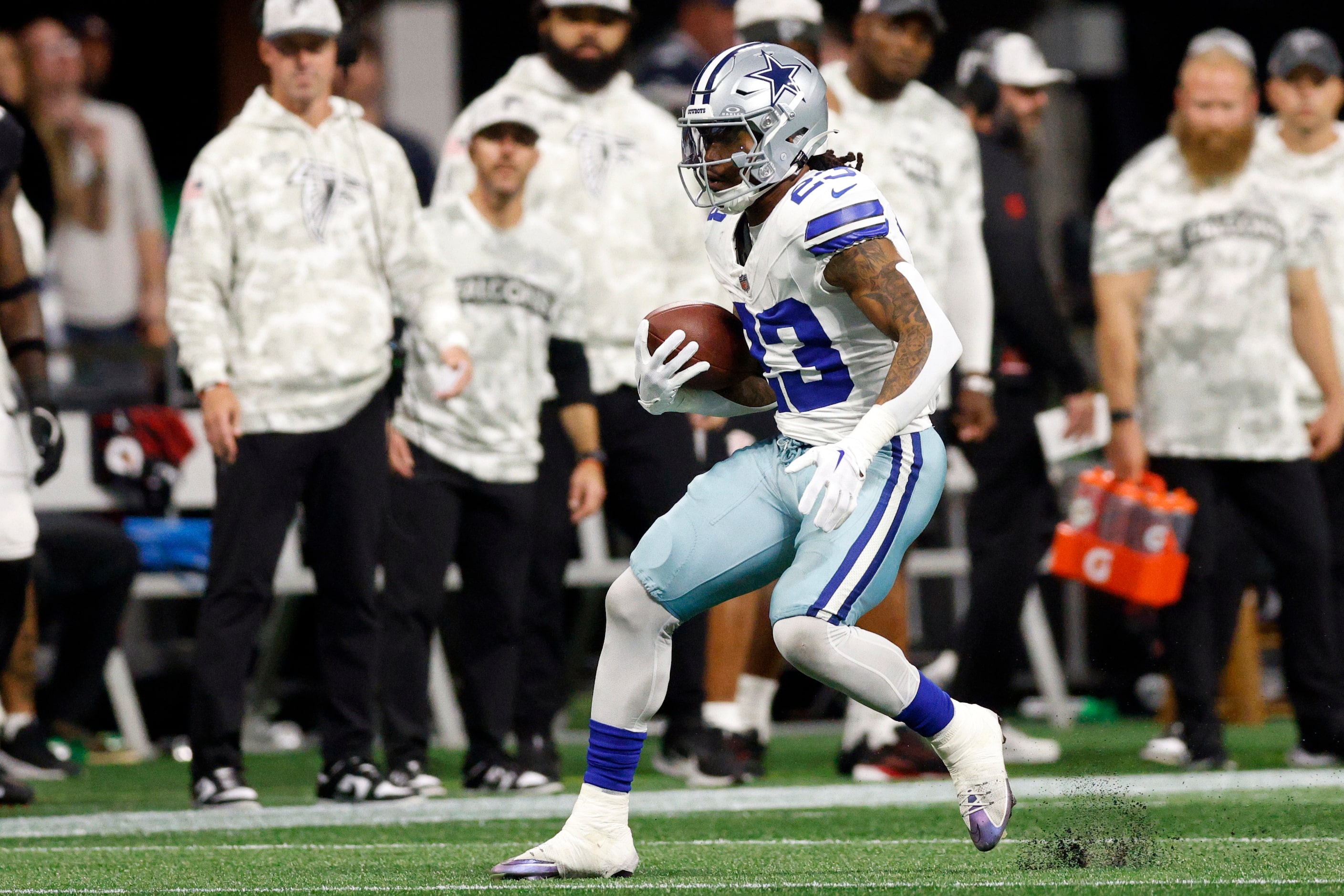 Dallas Cowboys running back Rico Dowdle (23) runs the ball during the first half against the...