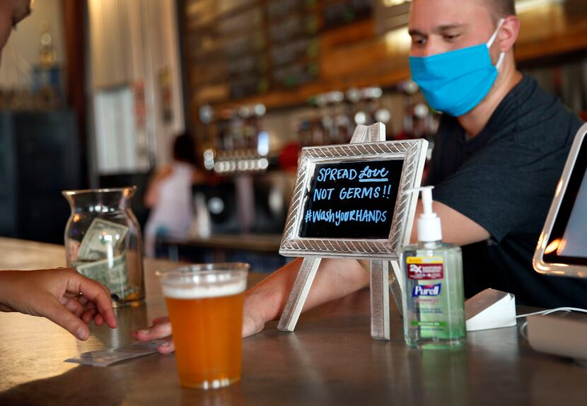 Reminders of the pandemic — masks, hand sanitizer, notes and signs — were plentiful at Legal...