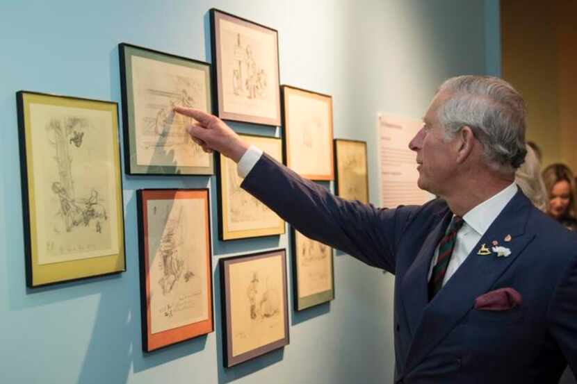 
In May, Prince Charles toured the Pooh Gallery, which houses a collection of Winnie the...