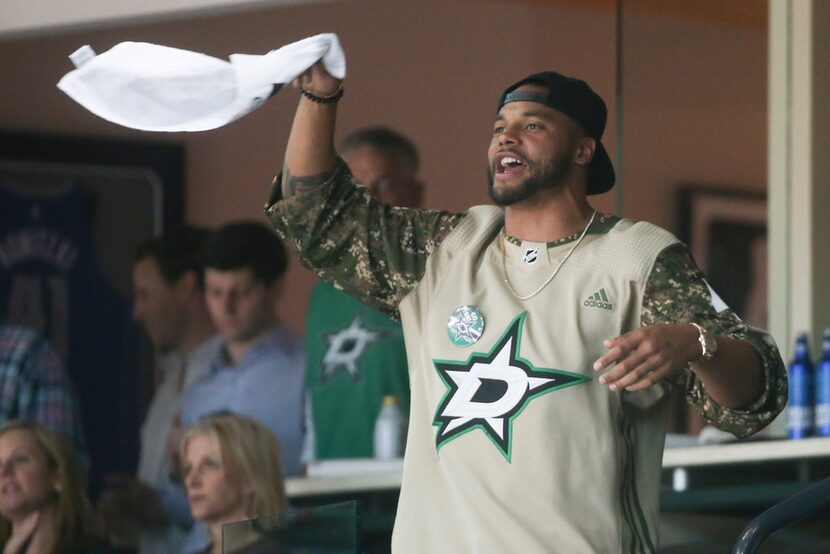 Dallas Cowboys quarterback Dak Prescott cheer on the Stars as they take on the Nashville...