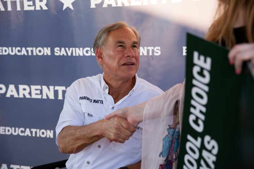 Gov. Greg Abbott hosts a tailgate at the First Dallas Academy football game Sept. 22.