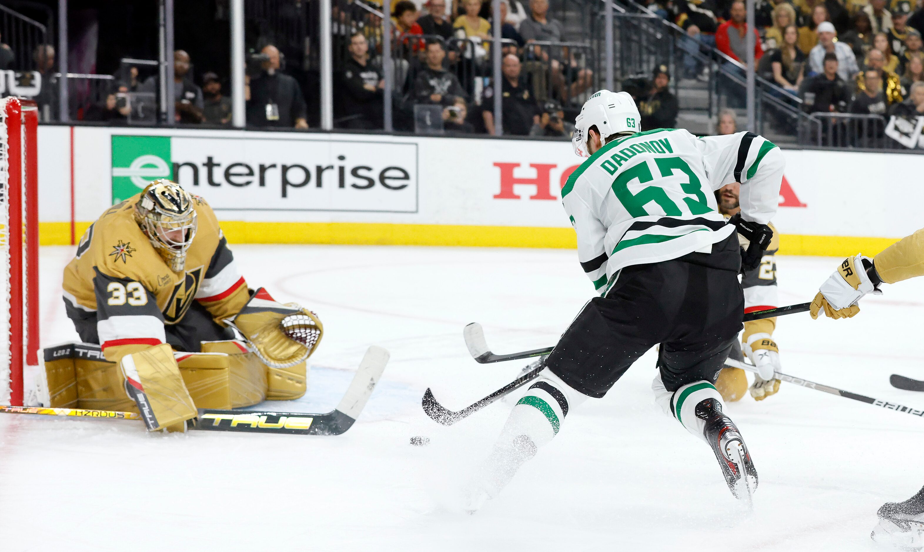 Dallas Stars right wing Evgenii Dadonov (63) attempts to score on Vegas Golden Knights...