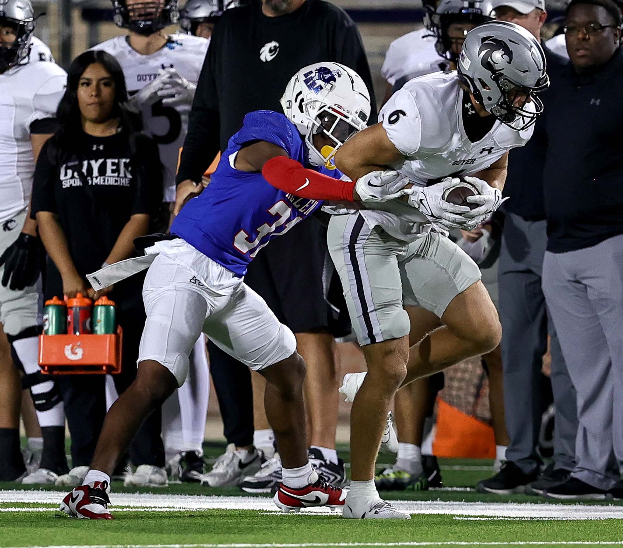 Denton Guyer wide receiver Kegan Stelmazewski (6) comes up with a reception and is pushed...