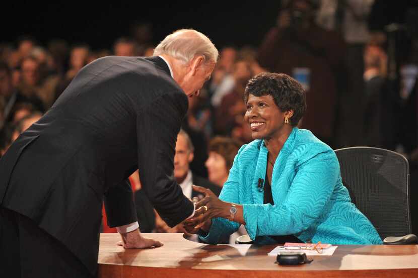 Debate moderator Gwen Ifill and then-Democratic vice presidential nominee Joe Biden shook...