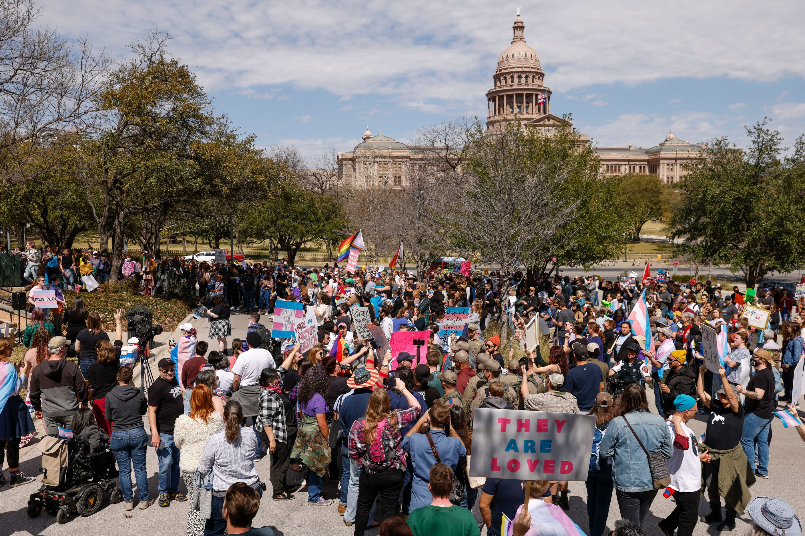 Demonstrators gather near the Texas State Capitol during the "Trans Kids Cry For Help" rally...