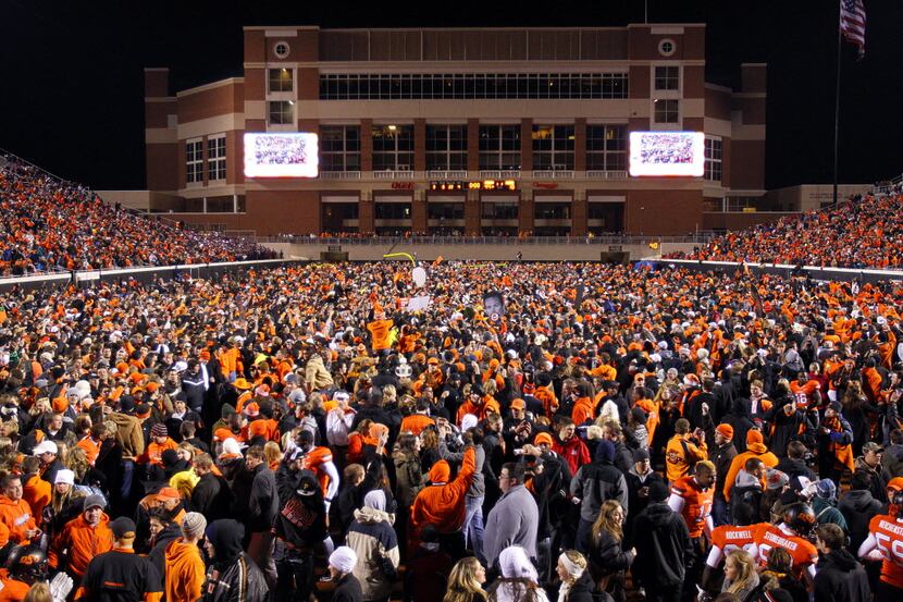 It was bedlam following Oklahoma State's win over Oklahoma as fans flooded the field at...