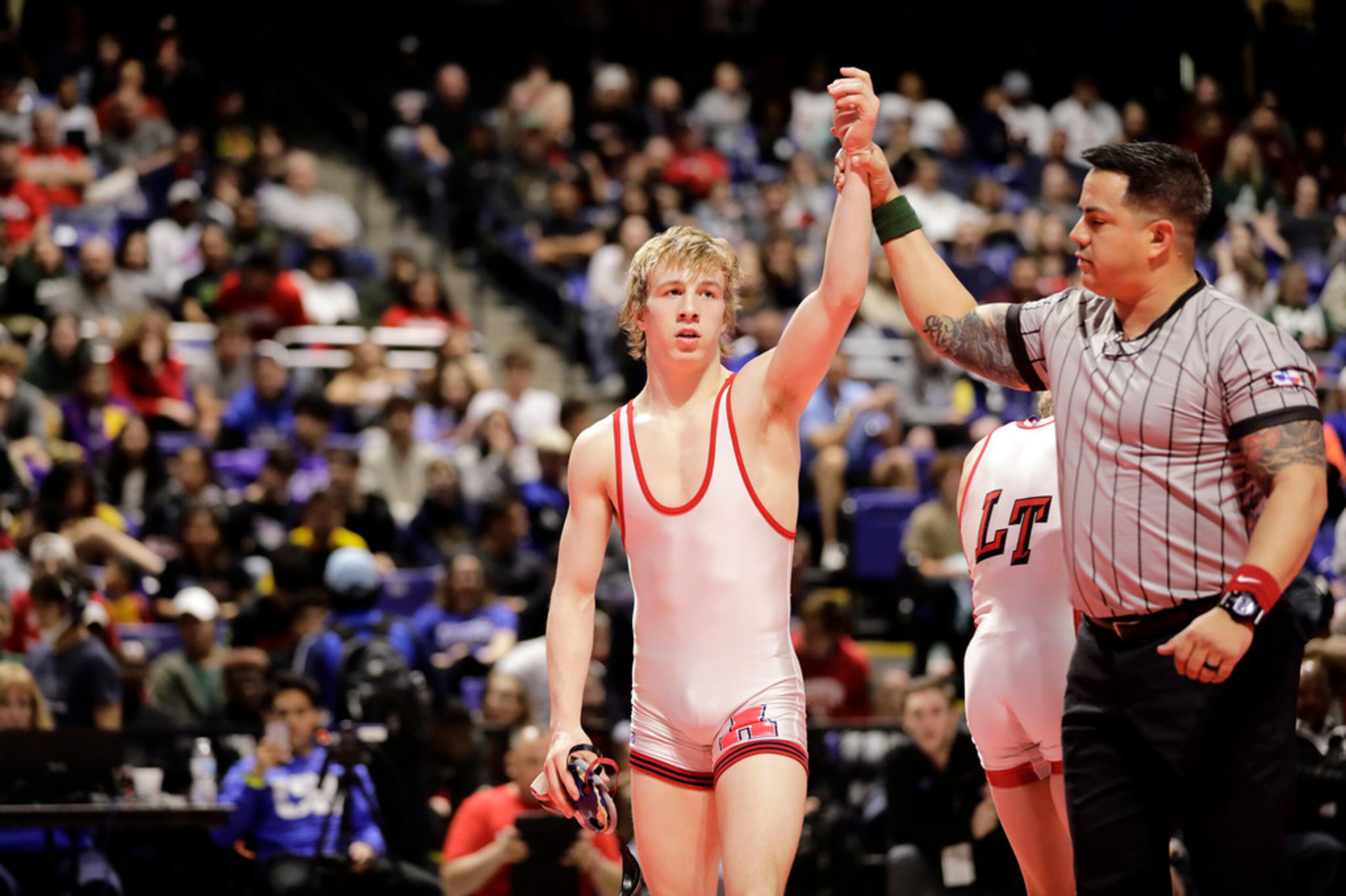 Braxton Brown of Allen wrestles during the UIL Texas State Wrestling Championships,...