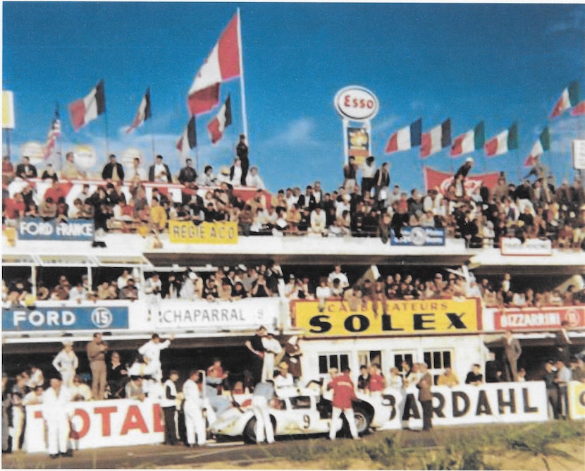 Mark Butcher took this color picture of a race car stopping in the pits at Le Mans. This was...