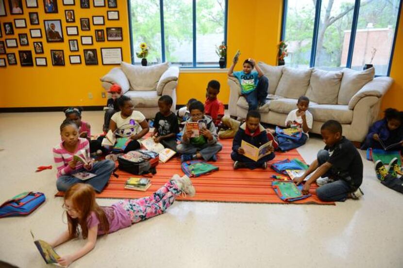 Children read books at the Boys and Girls Clubs of Collin County’s Plano branch at the...
