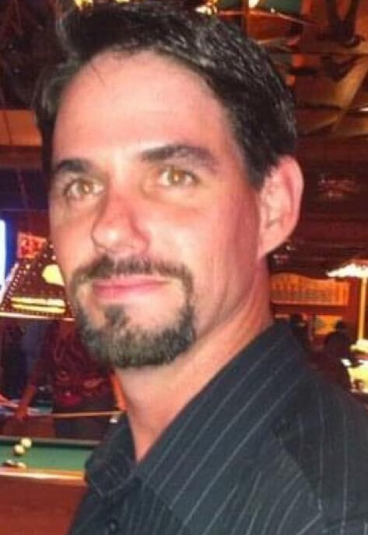 Michael Wells shown in an undated photo provided by his family. Wells, 47, was one of six...