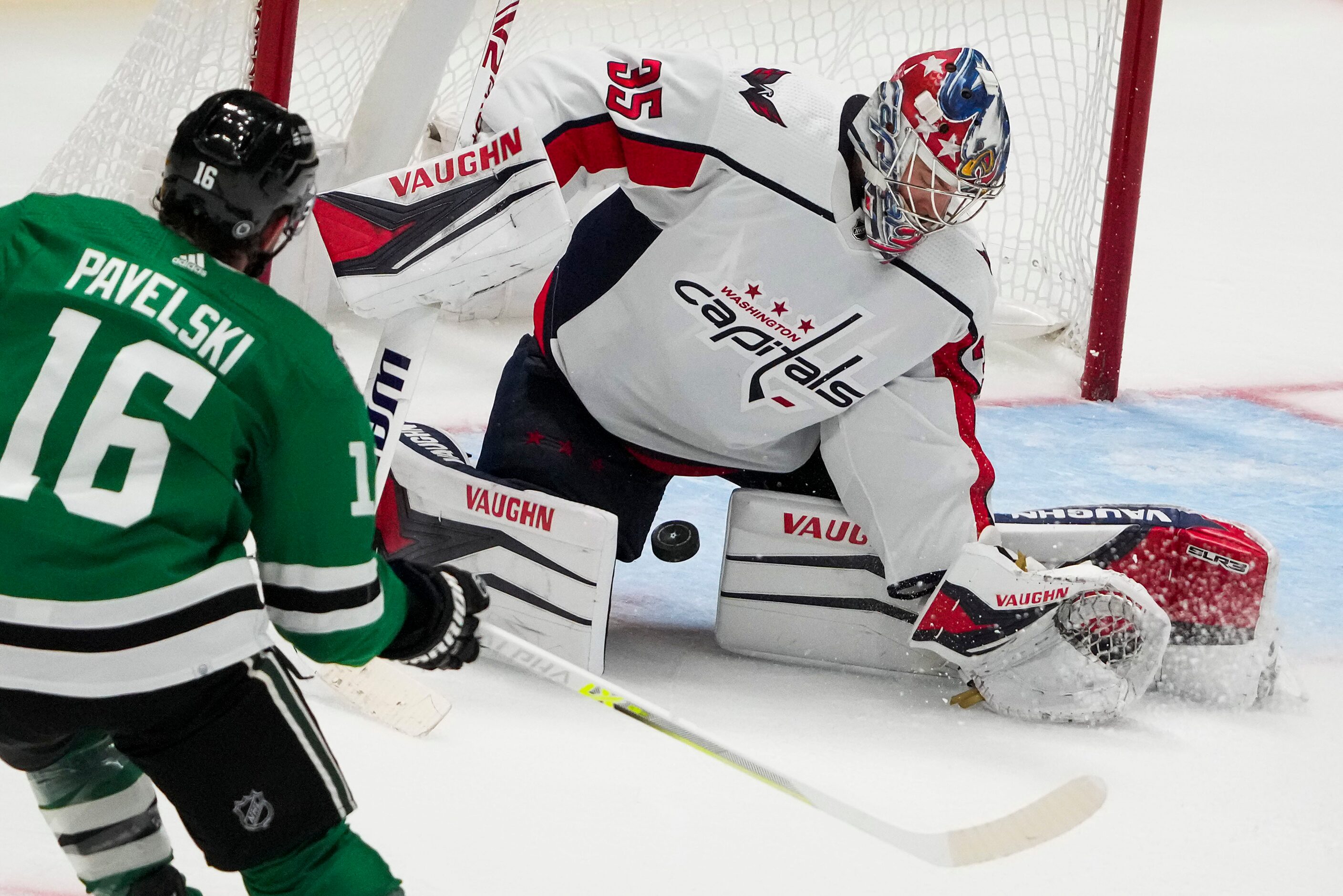 Washington Capitals goaltender Darcy Kuemper (35) makes a save against Dallas Stars center...