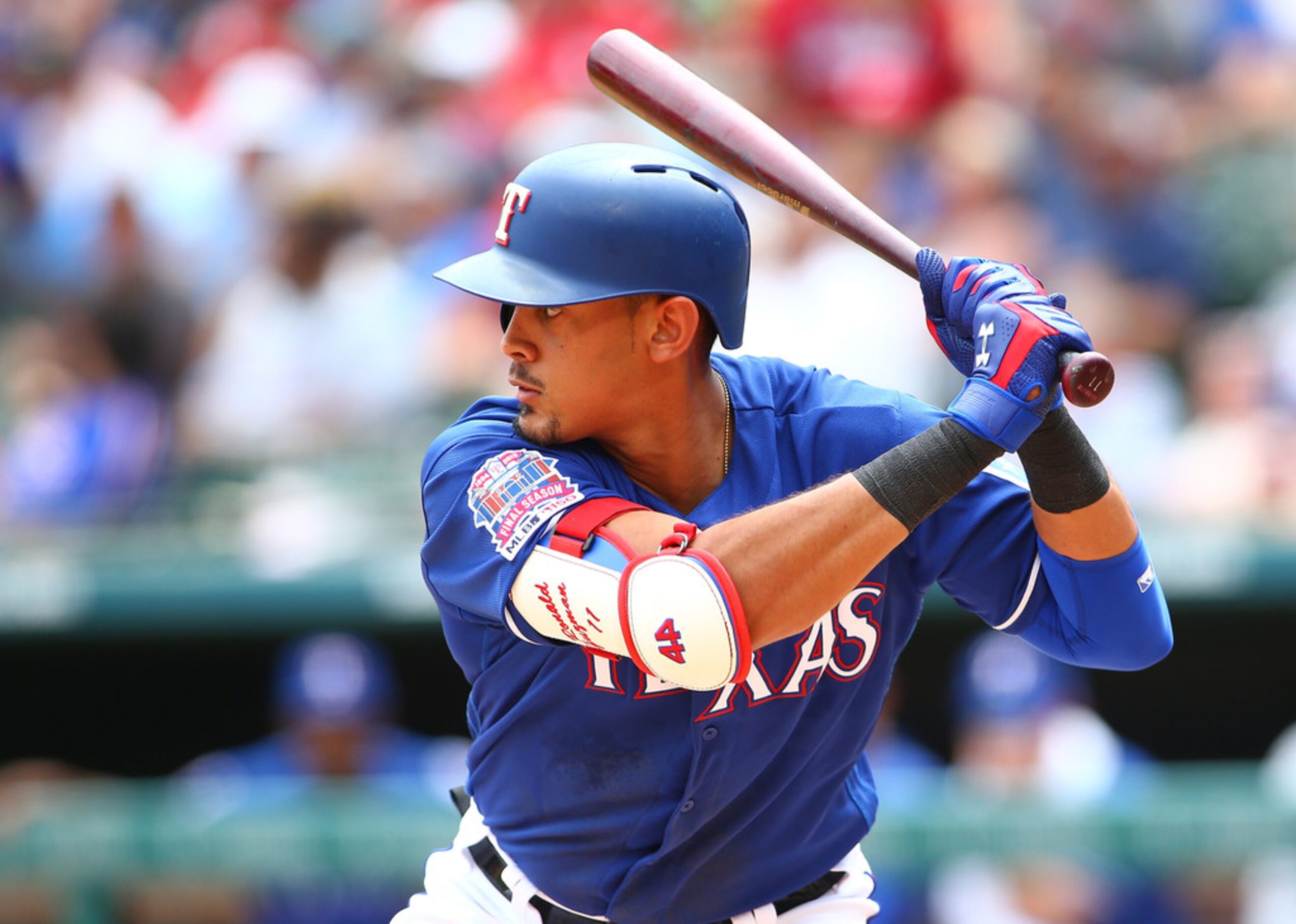 ARLINGTON, TX - JULY 14: Ronald Guzman #11 of the Texas Rangers hits in the second inning...