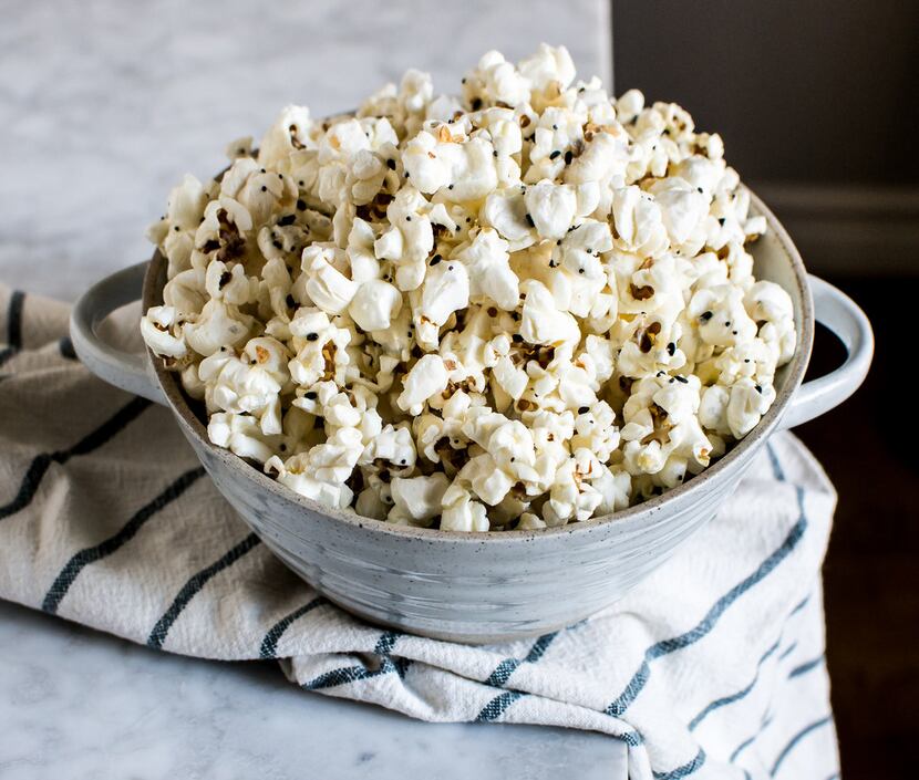 This homemade popcorn is topped with Everything But the Bagel Sesame Seasoning Blend from...
