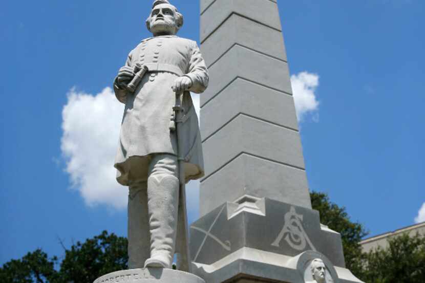 A statue of Gen. Robert E. Lee (bottom) stands at The Confederate War Memorial honoring...