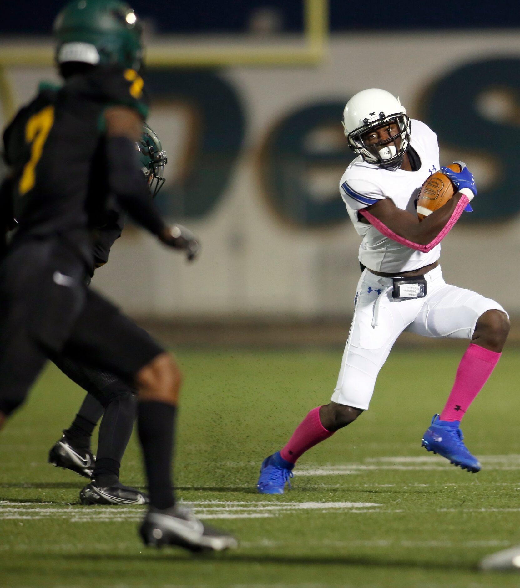 Trinity Christian Cedar Hill receiver Jordyn Williams (13) eyes the DeSoto defense as he...