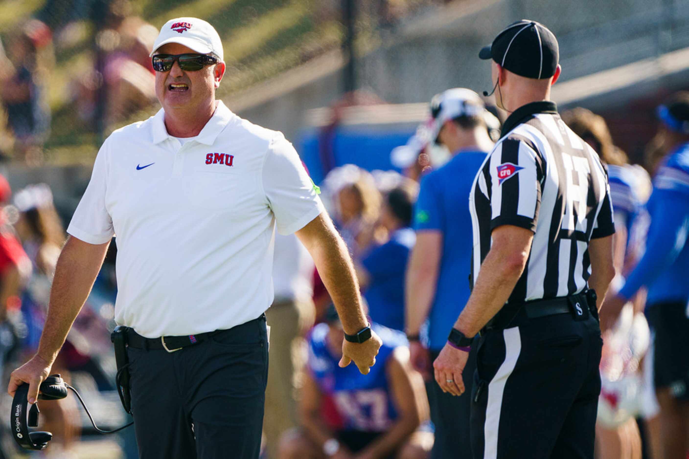 SMU head coach Sonny Dykes waits for officials to review a play during the first half of an...