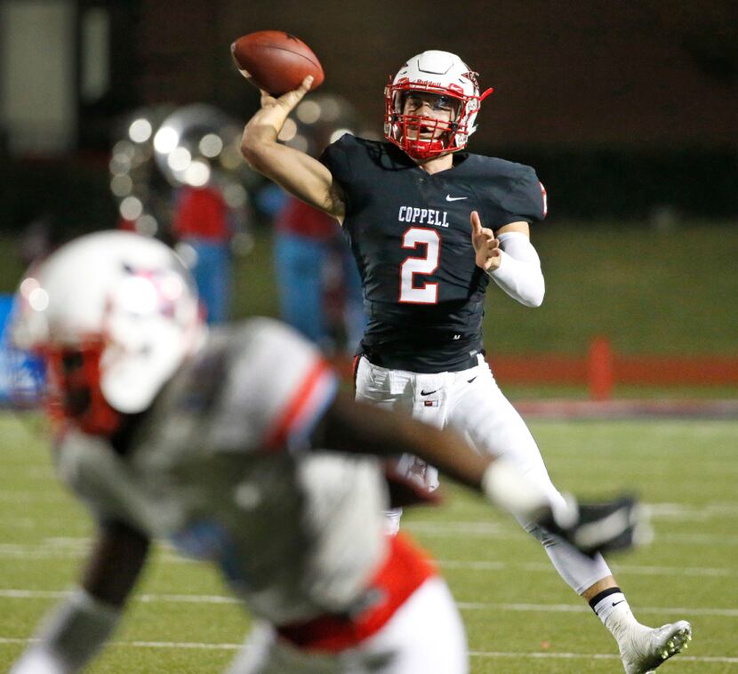 Coppell quarterback Brady McBride (2) throws a second-quoter pass during the Skyline High...
