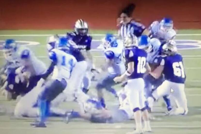 Game official Robert Watts was rammed by two San Antonio Jay High School players in an...