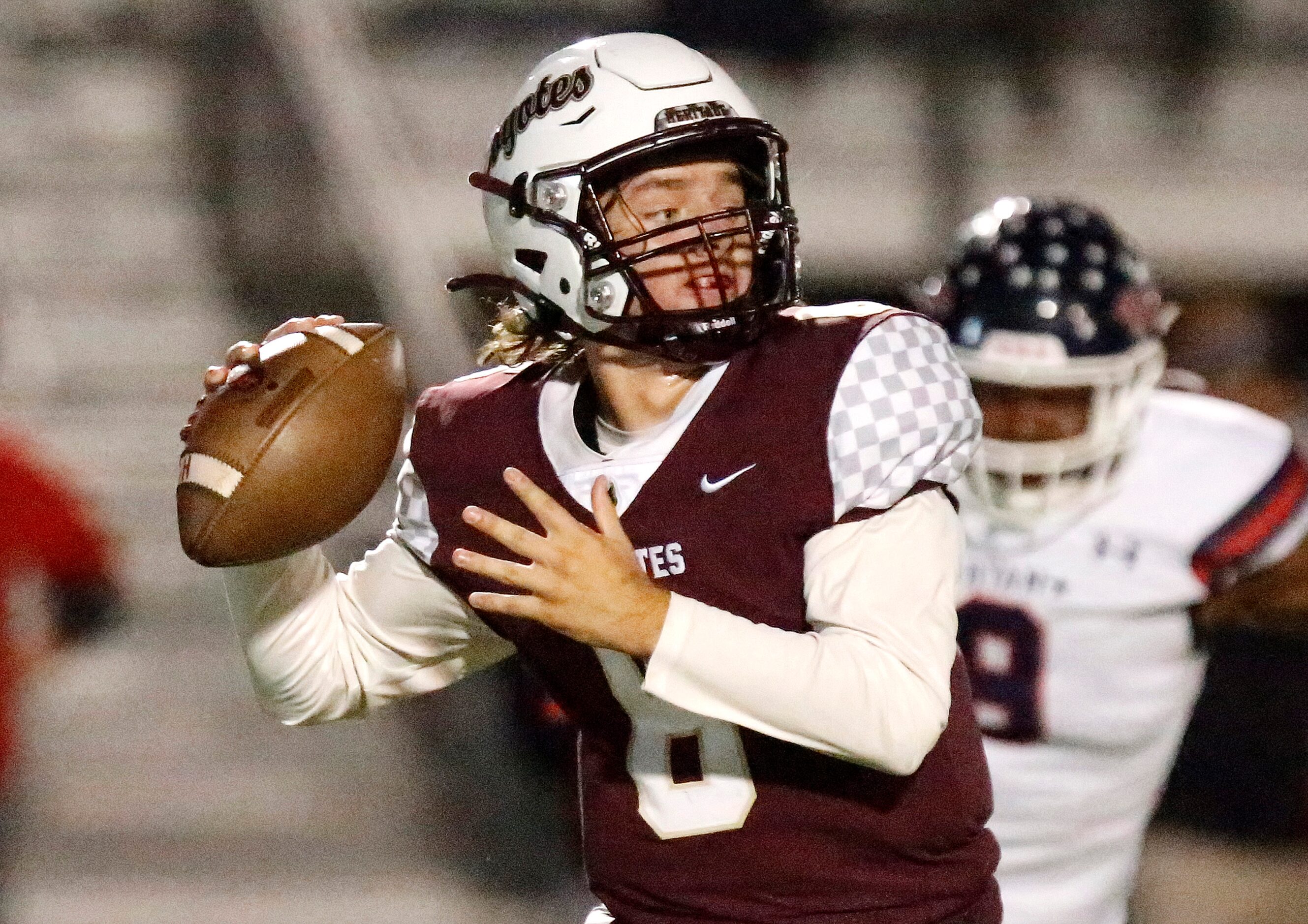 Frisco Heritage High School quarterback Easton Swetnam (6) throws on the run during the...