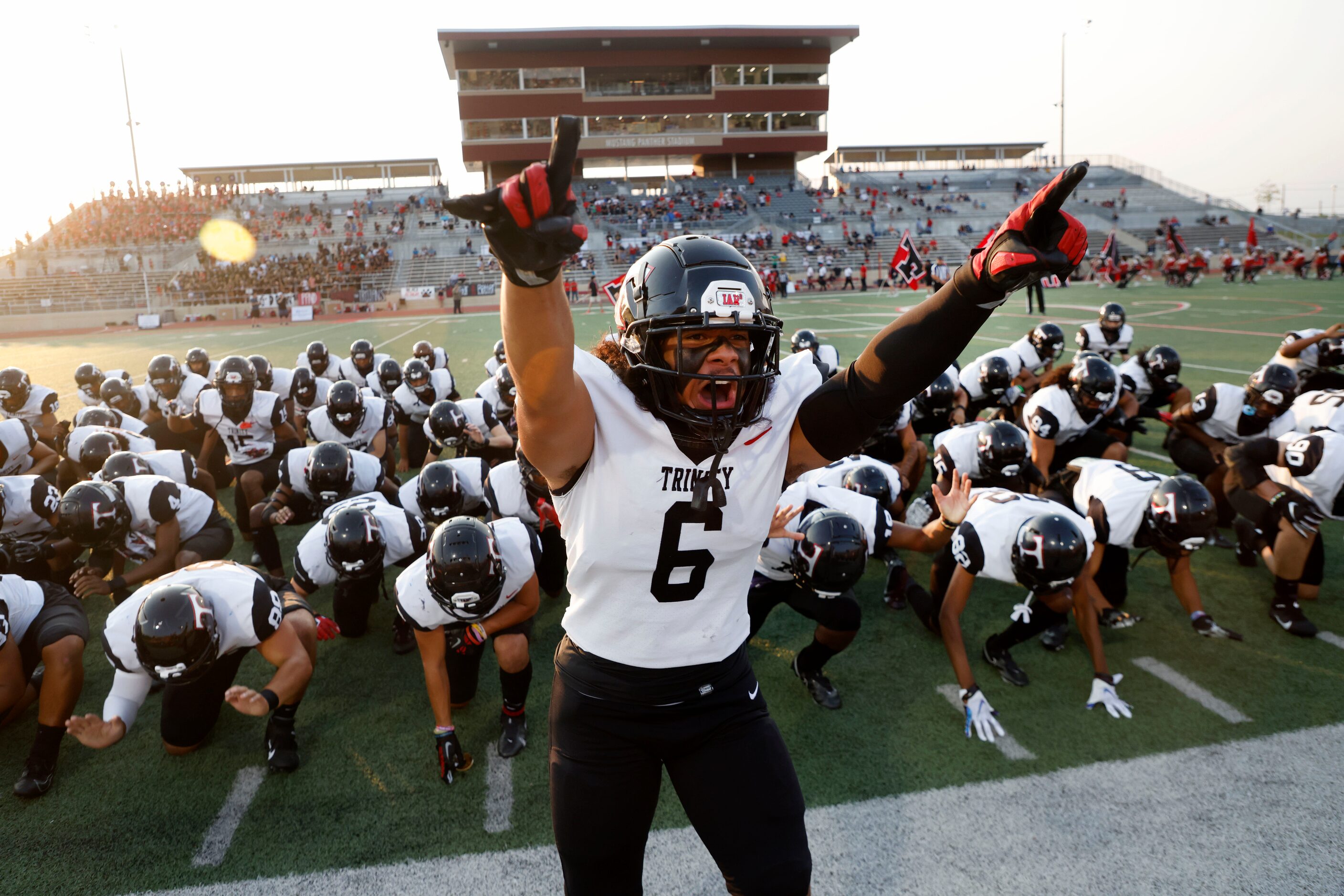 Euless Trinity linebacker Nai Mose (6) leads the team in the Sipi Tau prior to playing...