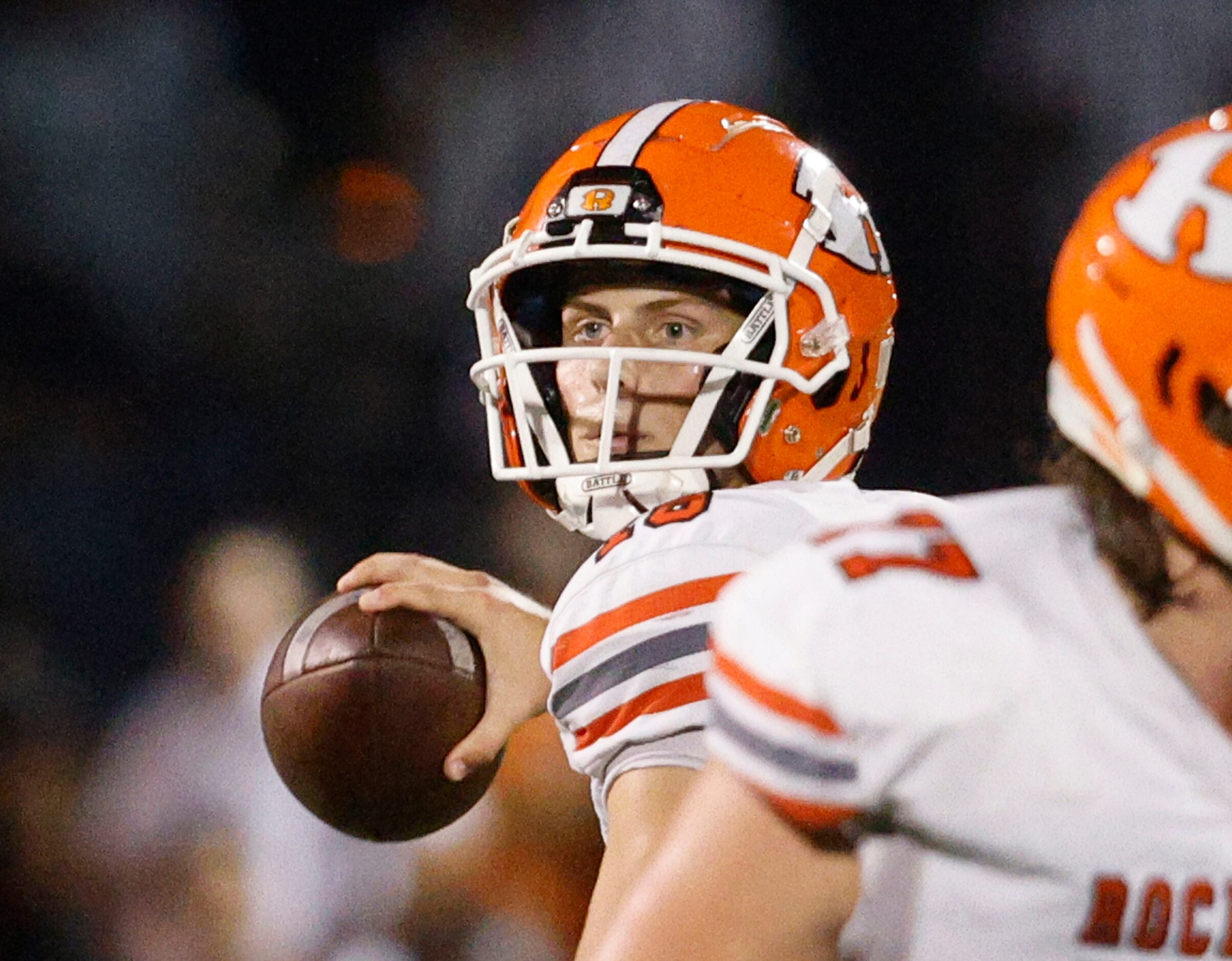 Rockwall's Mason Marshall (16) looks to throw the ball during the second half of a high...