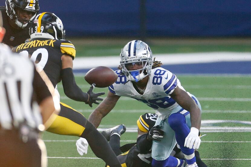Steelers cornerback Cameron Sutton (20) forces Cowboys wide receiver CeeDee Lamb (88) to...