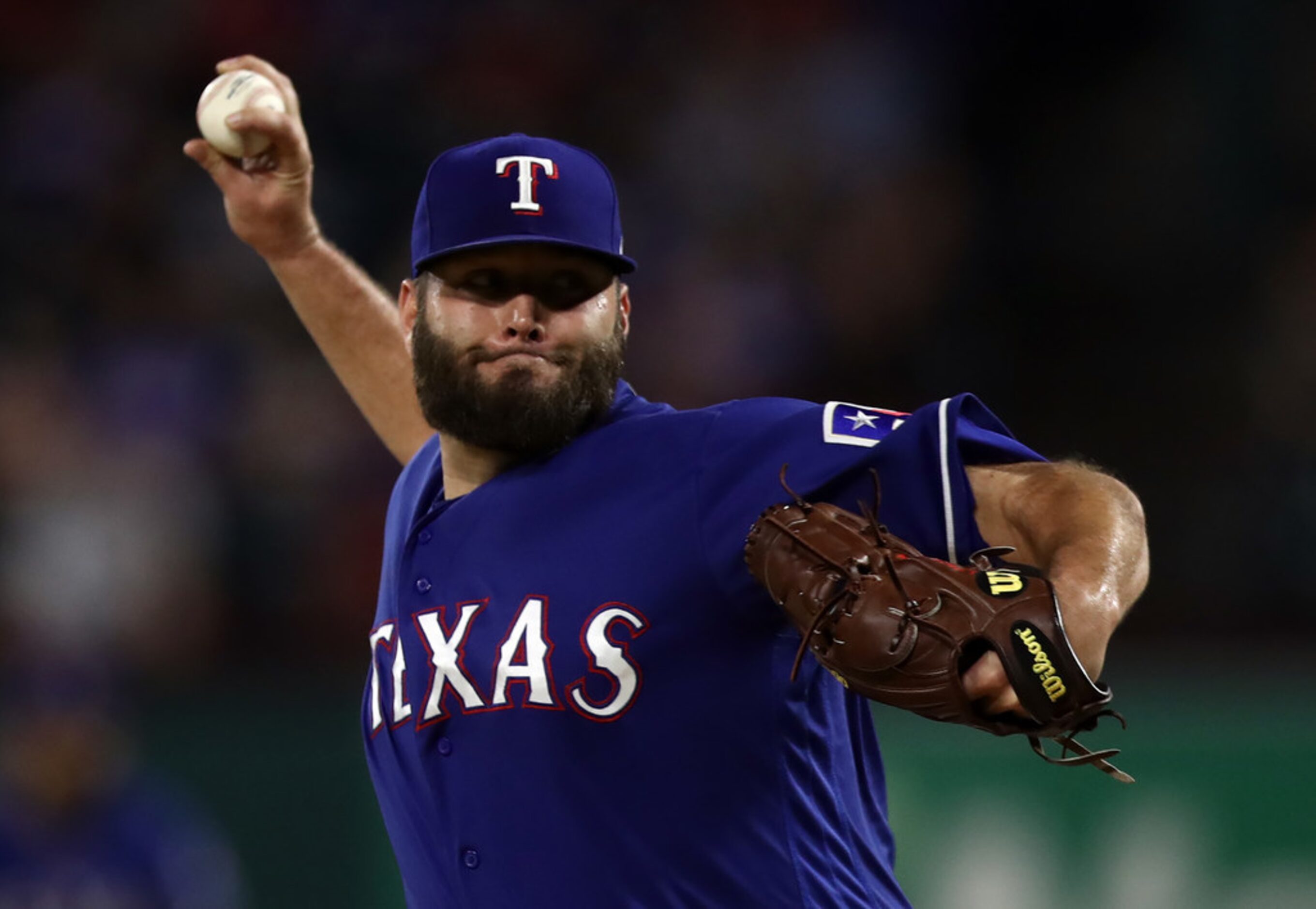 ARLINGTON, TEXAS - SEPTEMBER 10:  Lance Lynn #35 of the Texas Rangers throws against the...